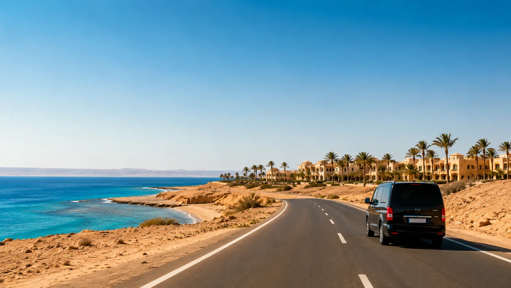 Private transfer vehicle travelling on the Red Sea coastal road to Marsa Alam